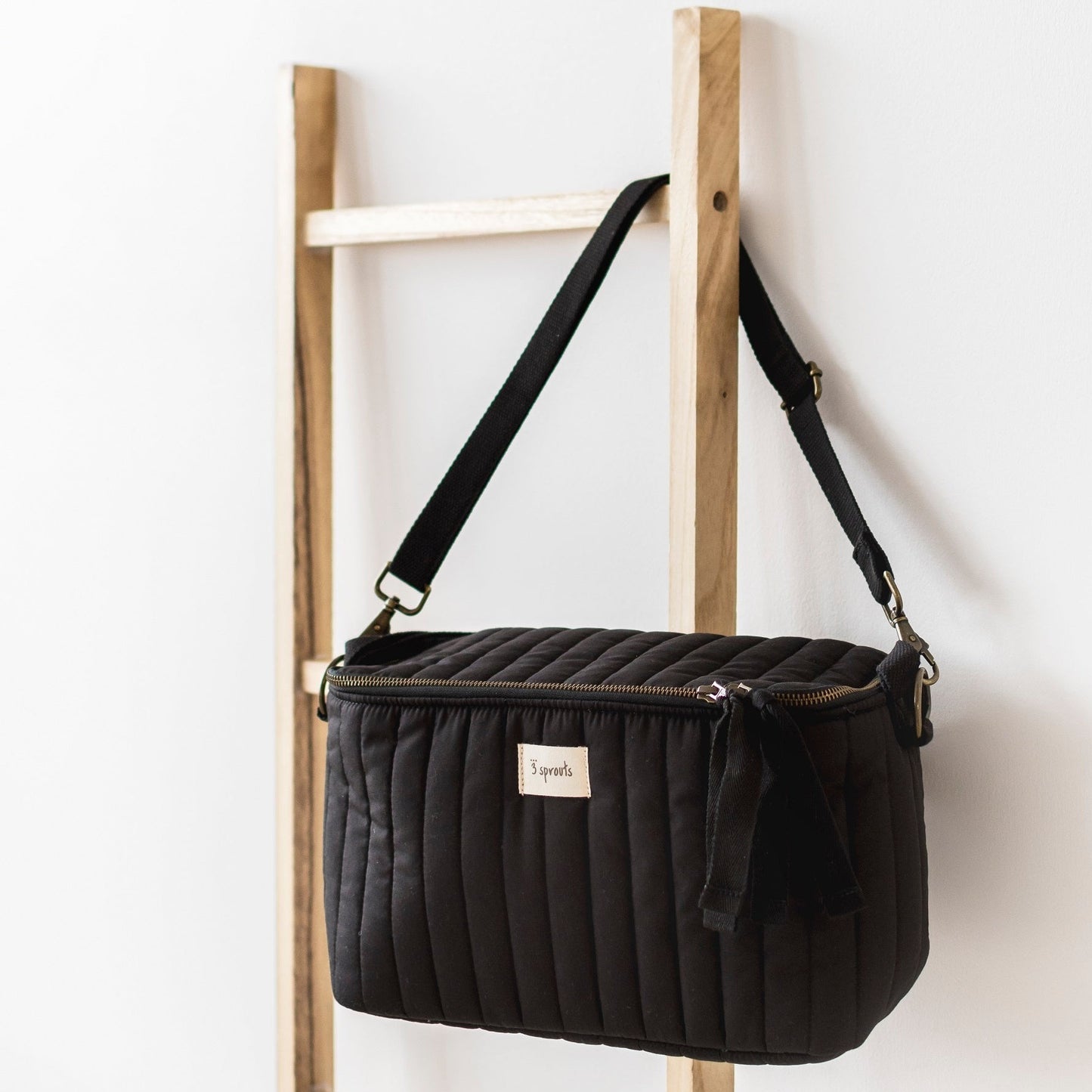 black quilted stroller organizer